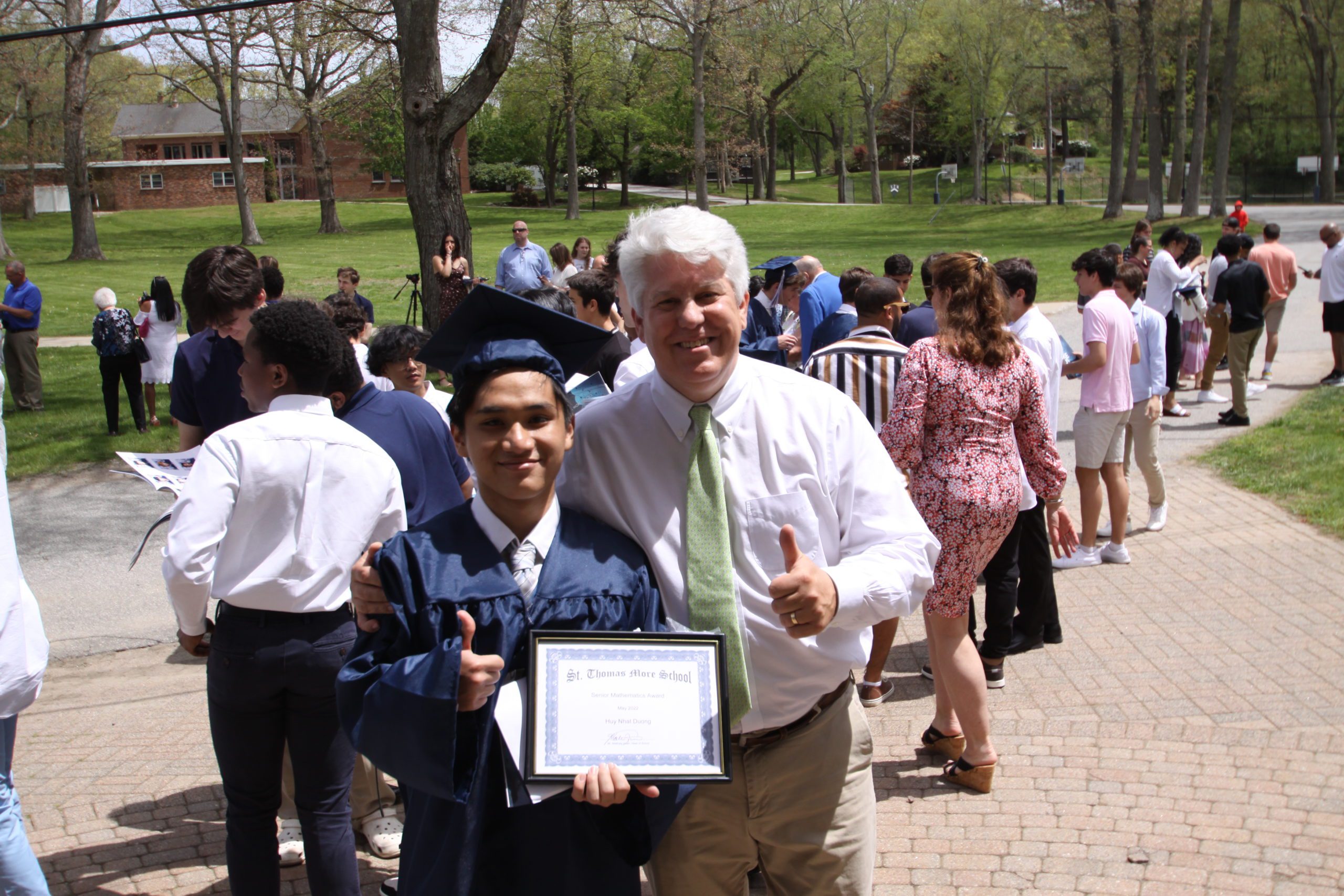 STM Graduate Holds Diploma